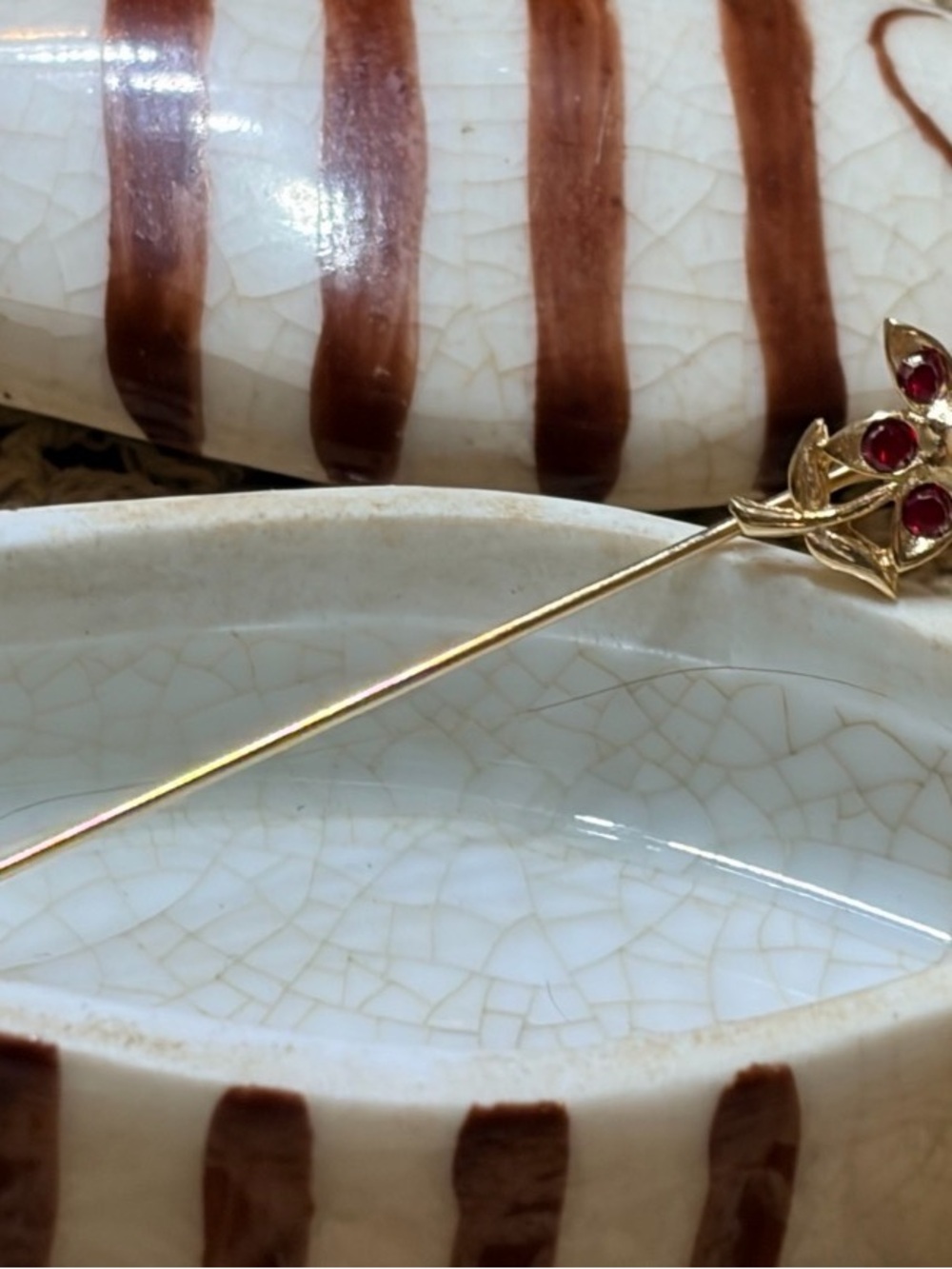 Gold Floral Stick Brooch with Red Gem Accents